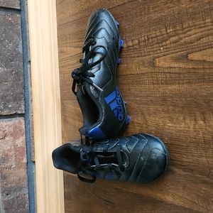 Size 1 black and blue adidas soccer cleats
